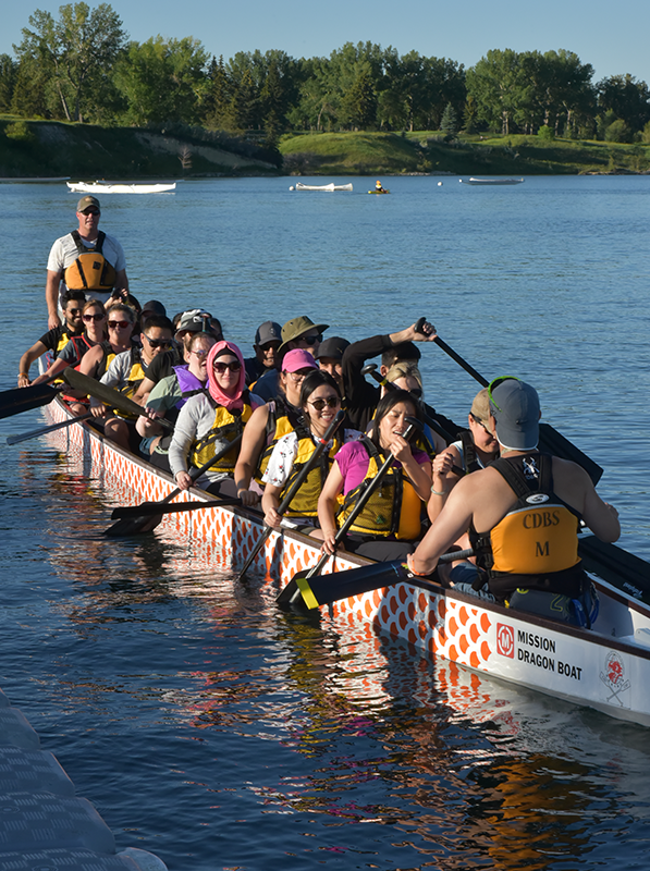 Fusion committee participating in Dragon Boat racing