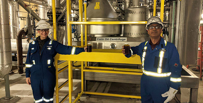 Tanya Nader, Plant Manager and Rajesh Gupta, Technical Manager, celebrate the production of corn oil at MEP.